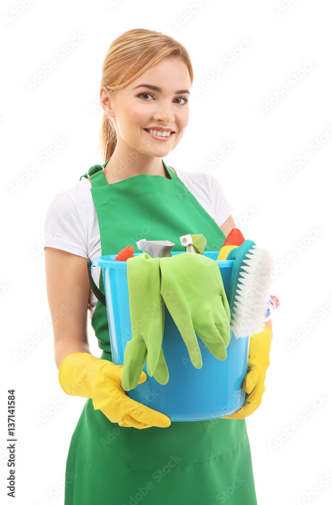 Young woman holding bucket with cleaning supplies on white background Young woman holding bucket with cleaning supplies on white background