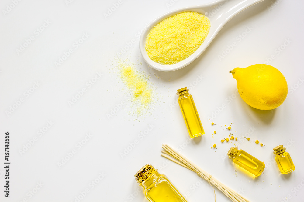 Cosmetic set from salt, oils and lemon white background top view mock-up Cosmetic set from salt, oils and lemon white background top view mock-up