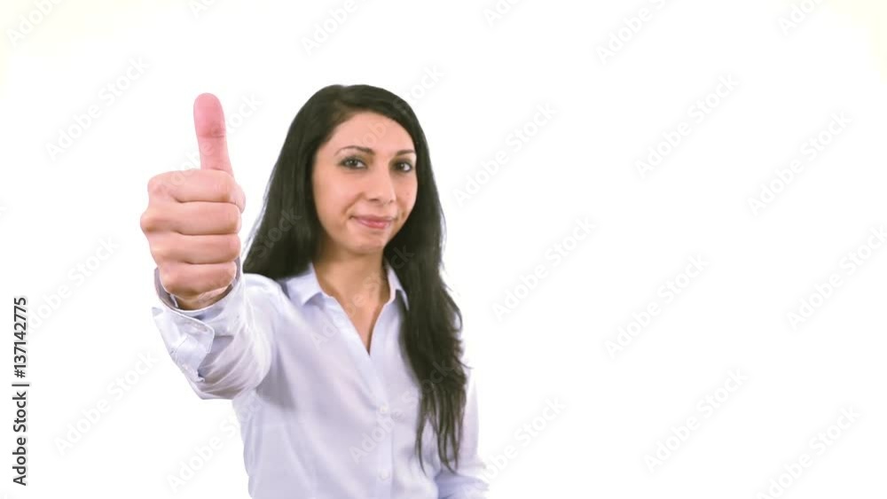 Caucasian woman smiling happy giving thumb up business success hand indoor white background, soft focused businesswoman Caucasian woman smiling happy giving thumb up business success hand indoor white background, soft focused businesswoman
