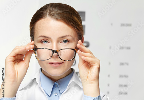 Young woman with spectacles...