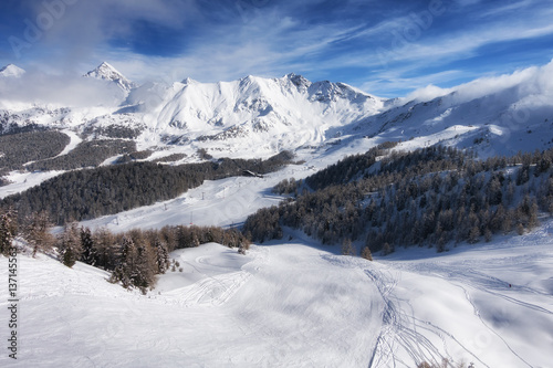 aerial mountain view of Pila ski resort in winter, Aosta, Italy