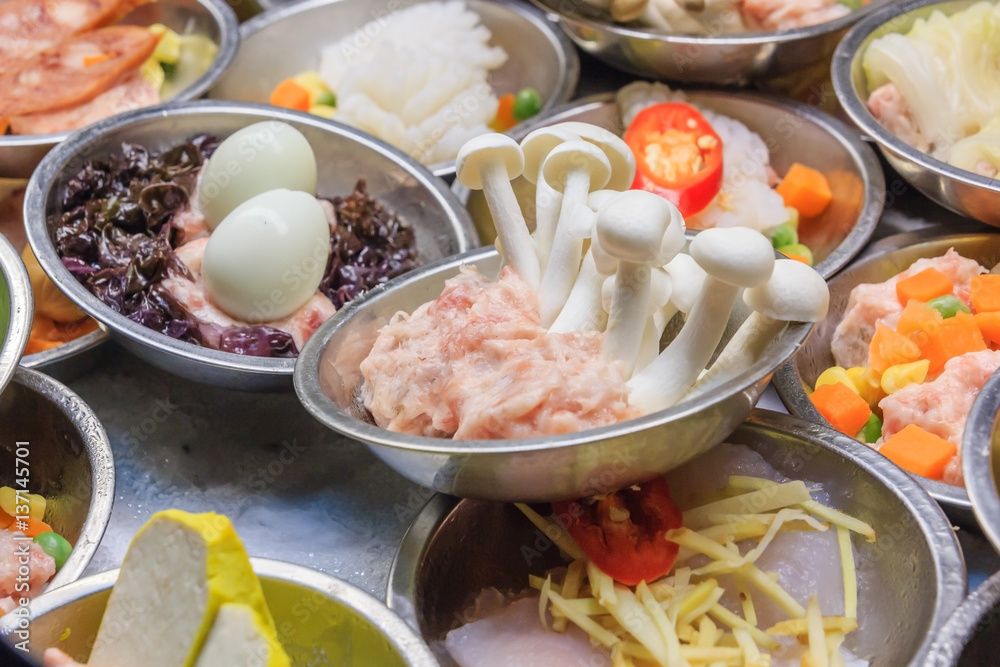 Various kinds of dim sum including dumplings, traditional chinese food. a kind of local breakfast of Chinese-Thai people who live in Southern part of Thailand Various kinds of dim sum including dumplings, traditional chinese food. a kind of local breakfast of Chinese-Thai people who live in Southern part of Thailand