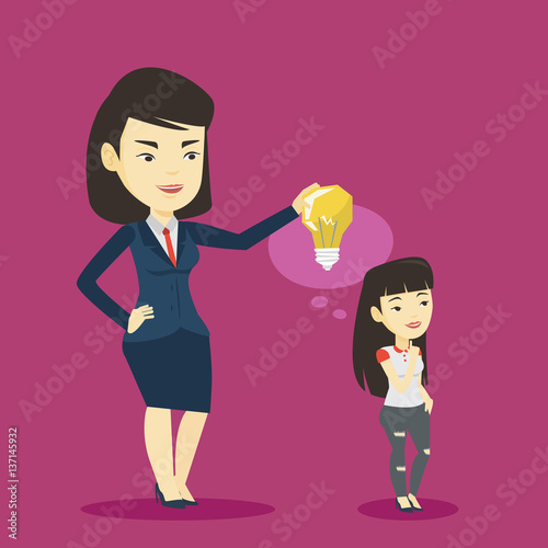 Business woman giving idea bulb to her partner. photo