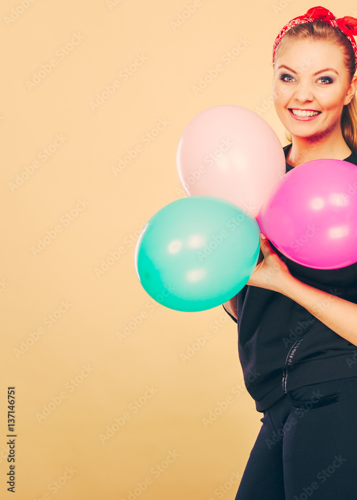 Smiling crazy girl having fun with balloons. Smiling crazy girl having fun with balloons.