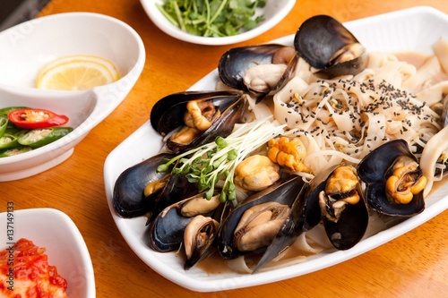 Delicious stir-fried rice noodles made from fresh mussels, shrimp, shellfish and seafood