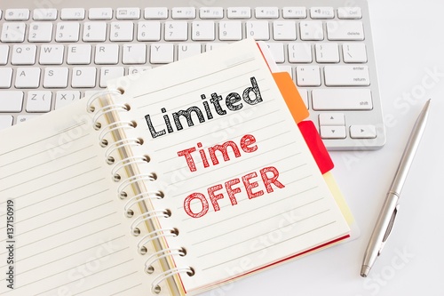 Word text Limited time offer on white paper on office table / business concept photo