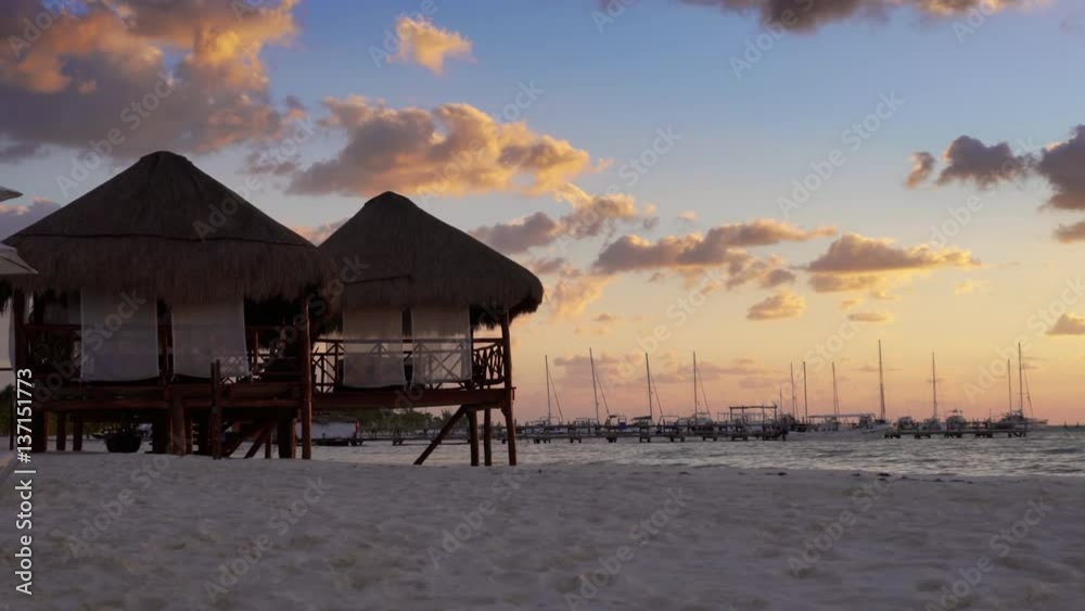 Beautiful tropical beach bungalow as the sun rises Beautiful tropical beach bungalow as the sun rises
