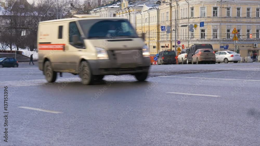 Cars stopping at a traffic light. Timelapse. Rapid movement of cars on city streets. In evening time. Cars stopping at a traffic light. Timelapse. Rapid movement of cars on city streets. In evening time.