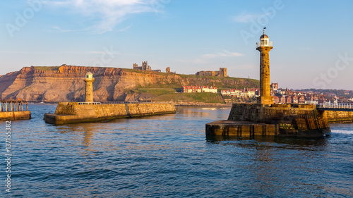 Evening mood at Whitby pier and harbour, North Yorkshire, England, UK