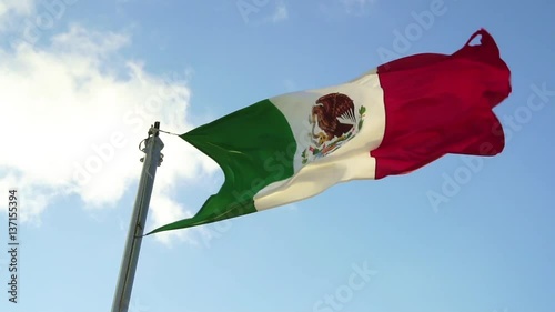 Slow motion footage of a Mexican Flag blowing in the wind, 120fps