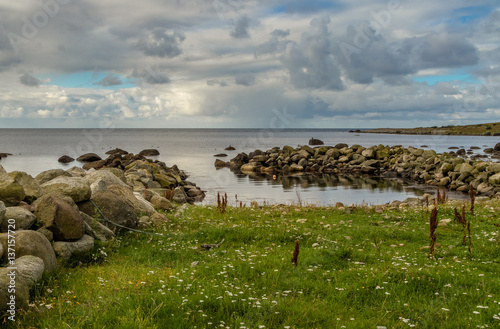 Breakwater, ocean and sky at Lista in southern Norway photo