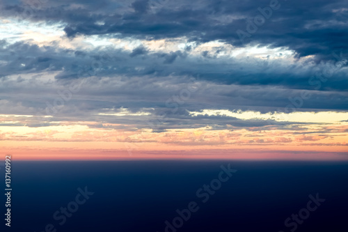 View sunset with sky and cloudy from airplane window when flying,Nature background