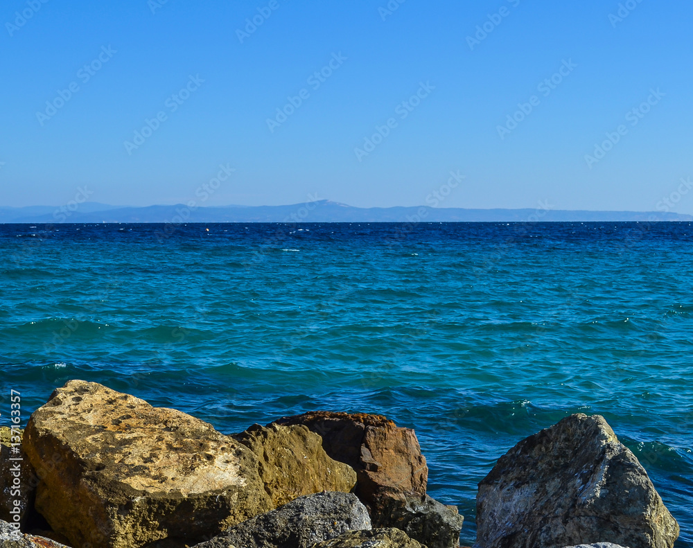 The sea and large stones Greece. Kassandra. Halkidiki The sea and large stones Greece. Kassandra. Halkidiki