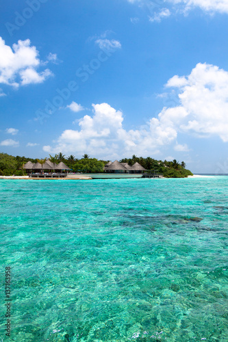 Lagoon and beach bungalows on Maldives Island