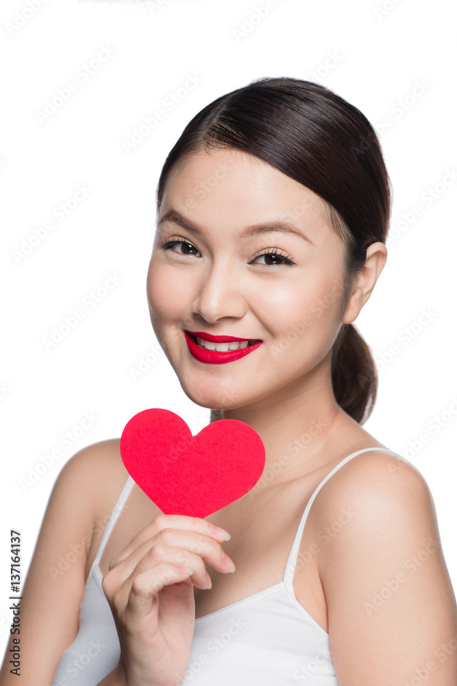 Attractive young woman with red heart. Valentine's day art portrait. Perfect make up Attractive young woman with red heart. Valentine's day art portrait. Perfect make up