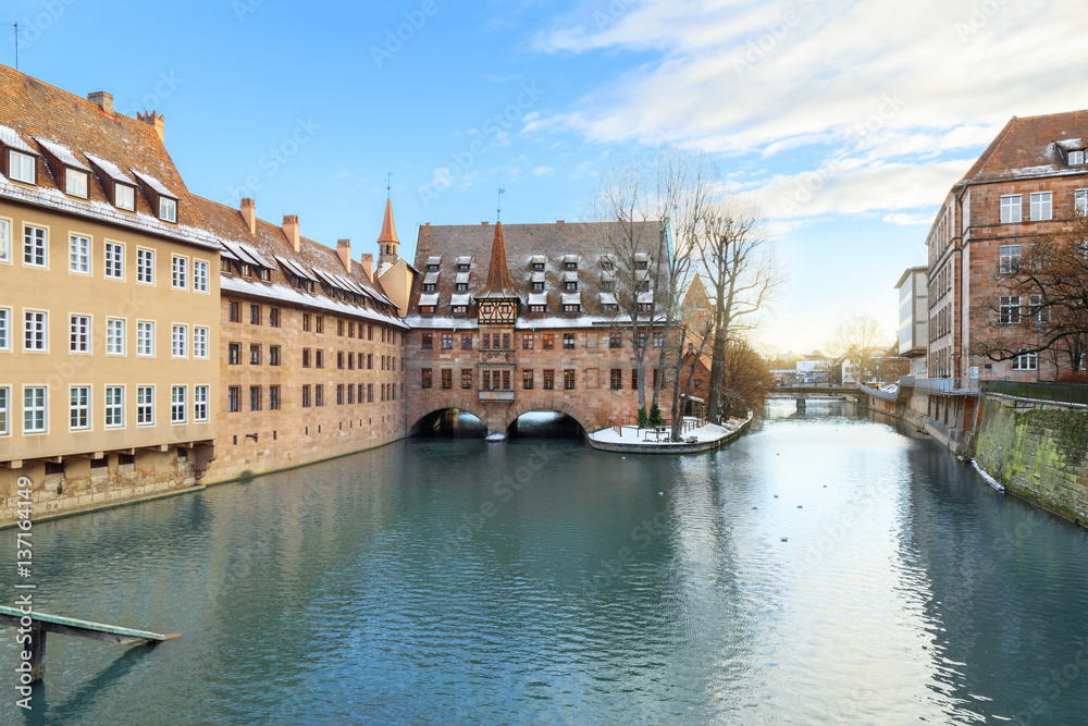 Winter landscape of The Hospital of the Holy Spirit on Pegnitz river in Nuremberg, Bavaria, Germany