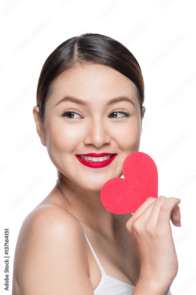 Attractive young woman with red heart. Valentine's day art portrait. Perfect make up Attractive young woman with red heart. Valentine's day art portrait. Perfect make up