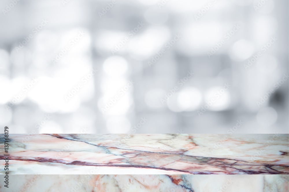 white marble stone countertop or table on white blurred abstract background / for display or montage your products white marble stone countertop or table on white blurred abstract background / for display or montage your products