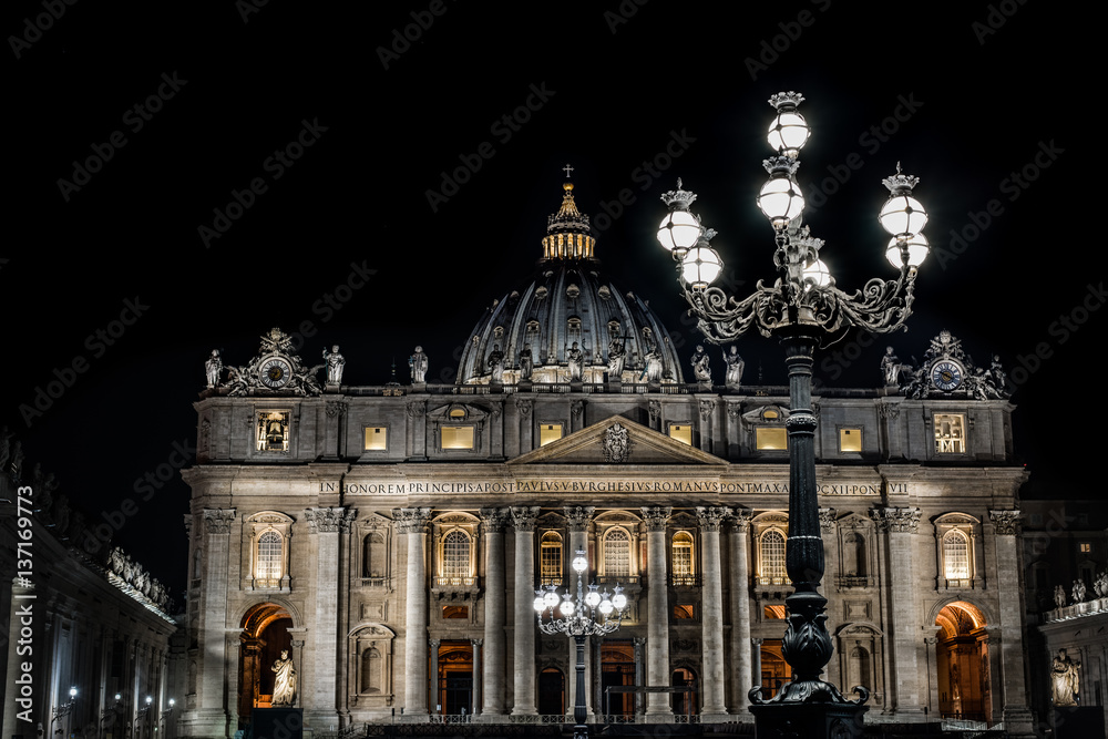 square in St. Peter's basilica illuminated by night. Rome