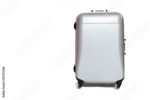 Silver shell suitcase standing on the white background photo