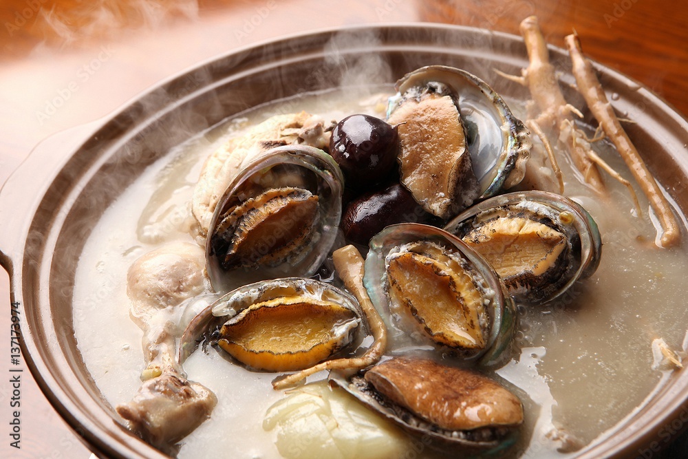 Fototapeta premium jeonbok Baeksuk. Whole Chicken Soup with Abalones