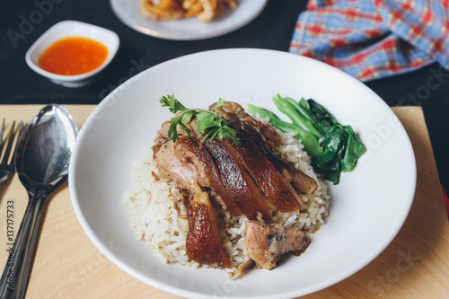 Stewed pork leg on rice with sauce.Thai food
