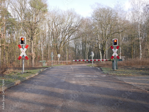 Fotografie Automated level crossing with the barriers down