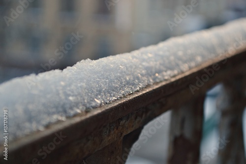 Snow cap on a balcony railing