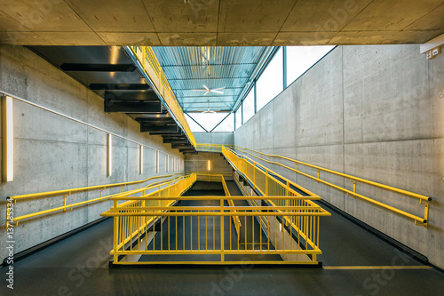 ramp way with yellow handrail for support wheelchair disabled people