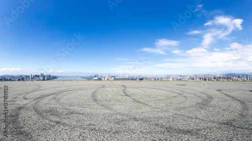 cityscape and skyline of hangzhou from empty road