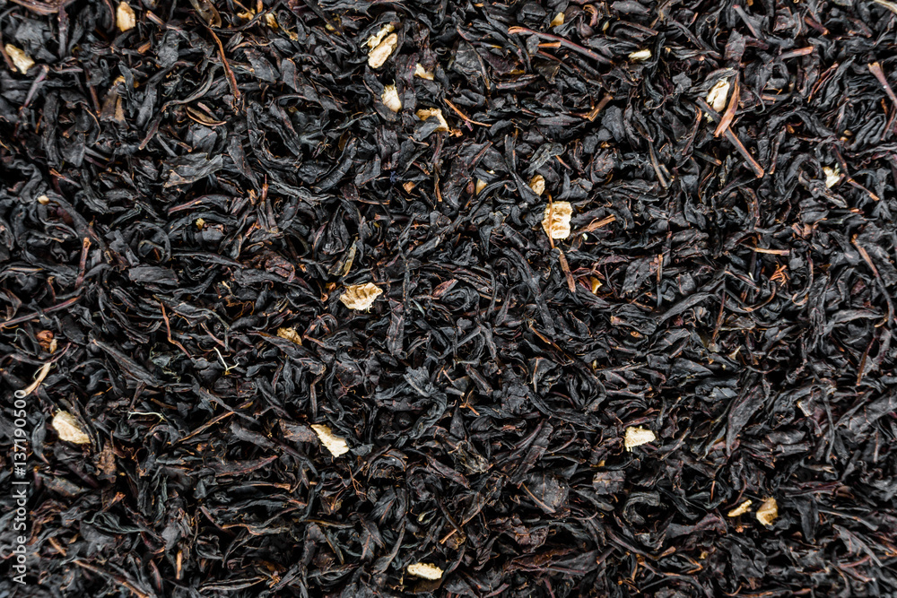 Black tea background. Heap of dry black tea Black tea background. Heap of dry black tea