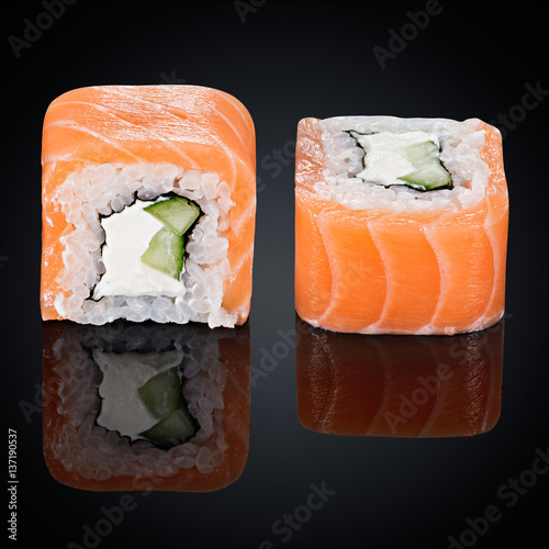 rolls with cucumber, salmon and cream cheese  photo