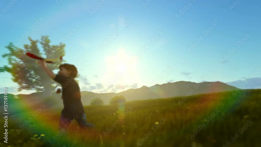 Little boy with airplane and grandfather resting on green meadow, morning sun, panning Little boy with airplane and grandfather resting on green meadow, morning sun, panning