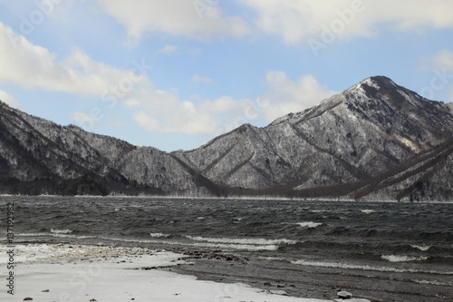 Winter landscape of Lake Chuzenji in Nikko city, Japan / Lake Chuzenji is known the famous winter sights in Nikko or Oku-Nikko