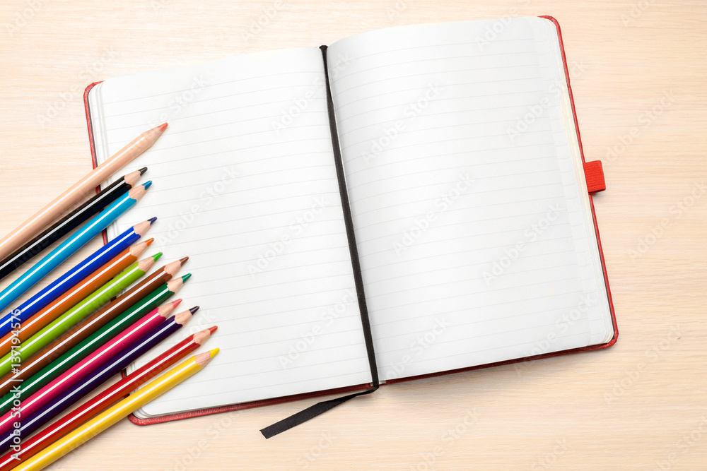 School supplies on wooden background School supplies on wooden background