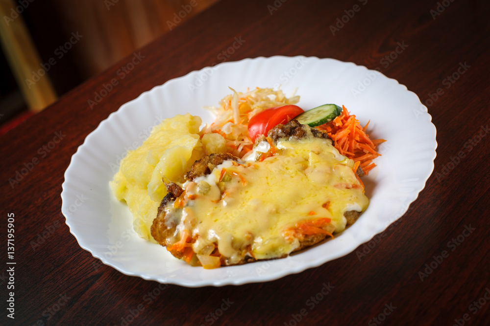 Steak with cheese vegetables and mashed potatos Steak with cheese vegetables and mashed potatos