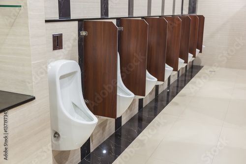 White standing urinal