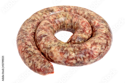 Ring of raw homemade sausages close-up isolate on a white background.