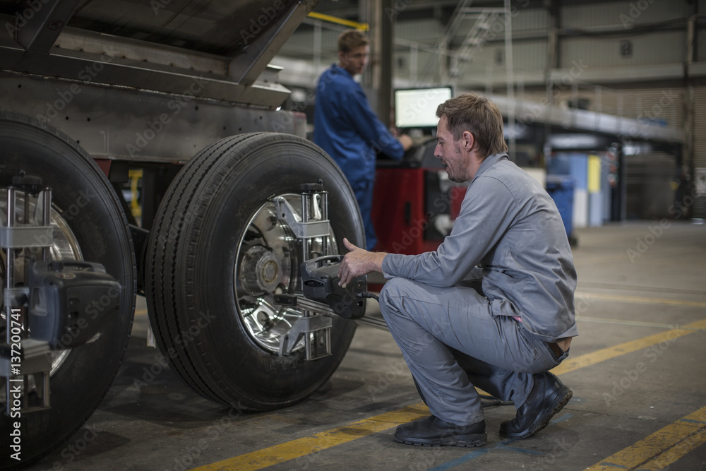 Factory worker in truck manufacture