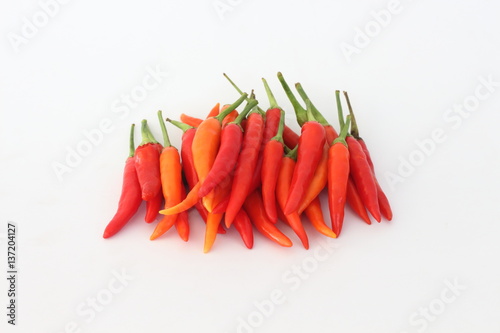 Red peppers on a white background.