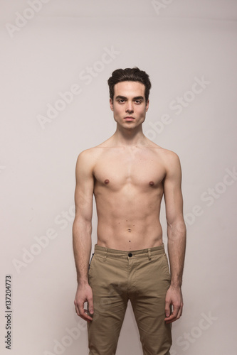 young man model shirtless body posing pants © HD92