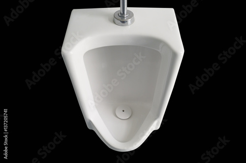 urinals on black background