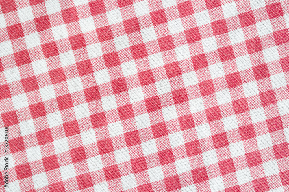 Red and white checkered picnic tablecloth. Red and white checkered picnic tablecloth.