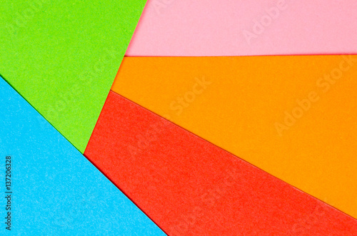 background of colored paper geometric shapes