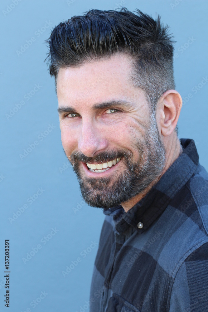 Fototapeta premium Handsome mature man smiling and laughing