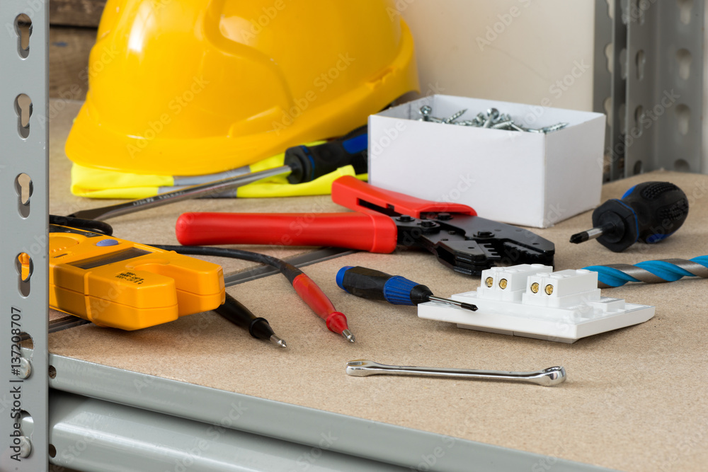 Electrical Tools and Supplies on Cork-Covered Shelving Electrical Tools and Supplies on Cork-Covered Shelving