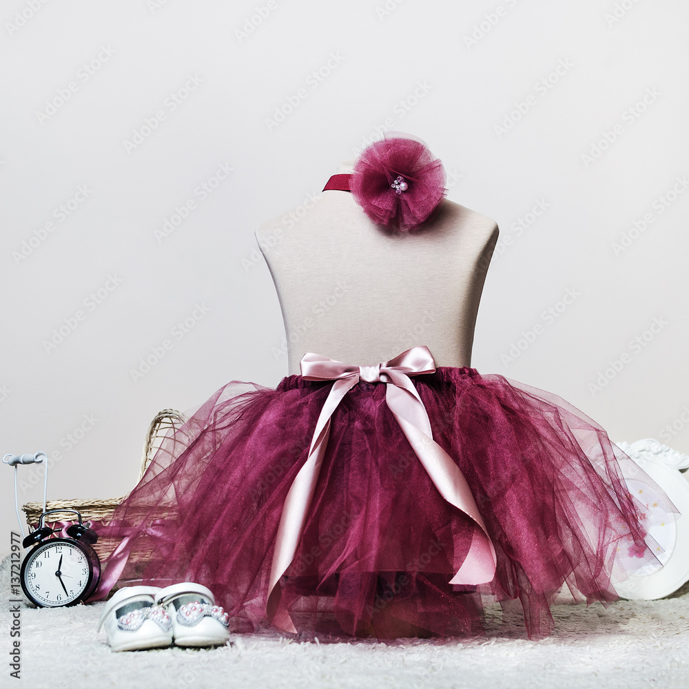 baby dress skirt ballet tutu and bow for a photo shoot on tailoring mannequin