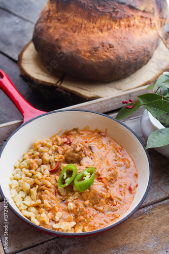 goulash with dumpling and fresh bread