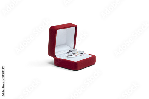 wedding rings and jewelry box on a wooden table