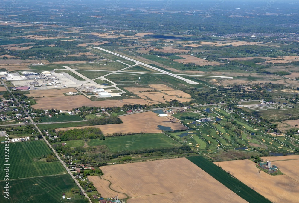 aerial view of the Hamilton Airport with partial view of Mount Hope and surrounding farmland and golf course 